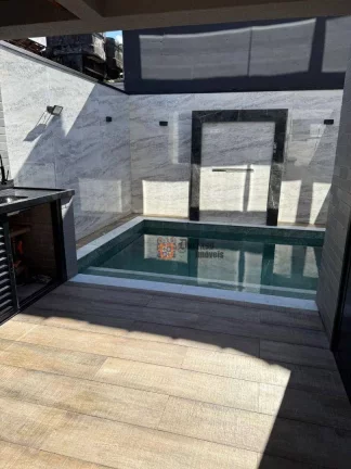 Imagem Sobrado com 4 suítes à venda, 204 m² por R$ 1.690.000 - Boqueirão - Praia Grande/SP