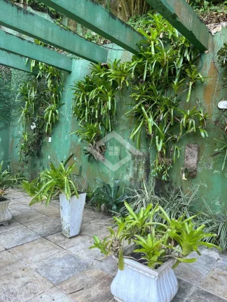 Imagem Casa Duplex de 4 Quartos para Venda na Gávea com 657 m²