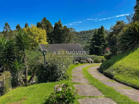 Imagem Casa Condomínio Campos do Jordão | 977 m² | 5 Suítes | Lazer Completo