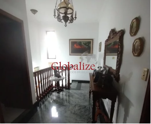 Imagem Belíssimo sobrado em Santos no bairro do Embaré com 4 dormitórios, duas suítes, duas vagas e quintal com churrasqueira à venda por R$ 1.490.000,00