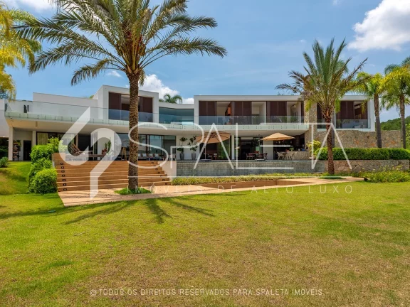 Imagem Casa beira lago e totalmente mobiliada à venda no condomínio Fazenda Vila Real em Itu