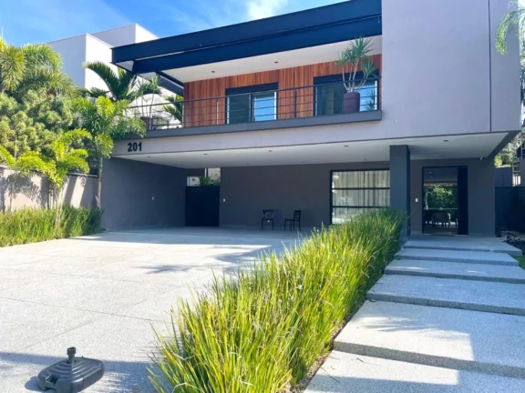 Imagem Casa de luxo à venda em Riviera de São Lourenço Módulo 24: 5 quartos, 5 suítes, 3 salas, 6 vagas de garagem, 400m².