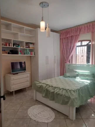 Imagem Casa com 3 dormitórios à venda, 390 m² por R$ 900.000,00 - Centro - Ferraz de Vasconcelos/SP
