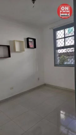Imagem Sobrado à venda, 75 m² por R$ 450.000,00 - Macuco - Santos/SP