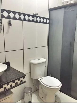 Imagem Casa térrea 3 dormitórios no bairro Tude Bastos