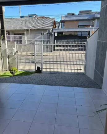 Imagem Sobrado com 3 dormitórios sendo 1 suíte e 2 vagas - Iririú | Joinville/SC