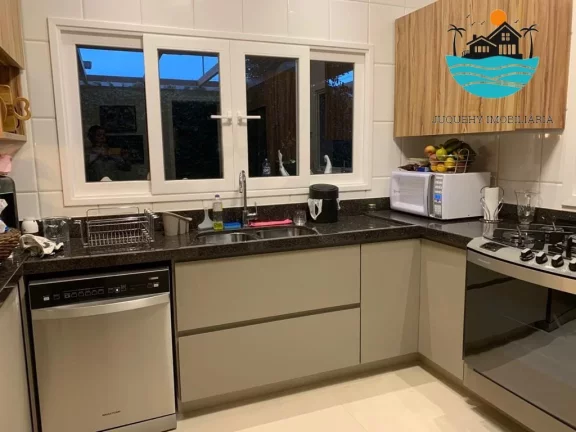Imagem Casa em condomínio para locação em Juquehy com 4 suítes, Acomoda 12 pessoas a 150 metros da praia | Juquehy Imobiliária