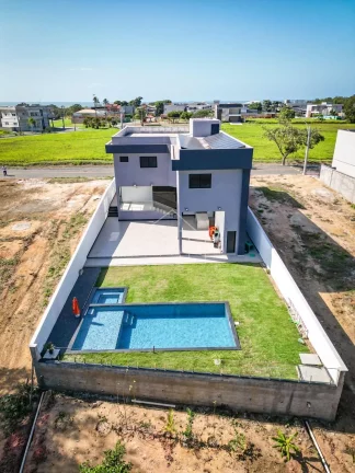 Imagem Mansão 5 quartos sendo 3 suítes com closet à venda no Condomínio Arquipélago de Manguinhos