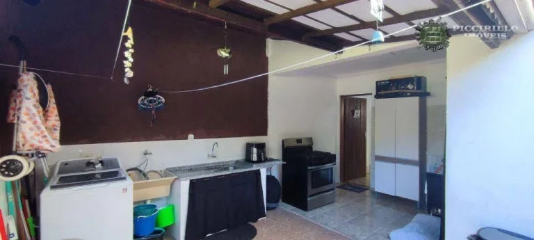 Imagem Sobrado com 3 dormitórios à venda, 118 m² por R$ 680.000,00 - Canto do Forte - Praia Grande/SP