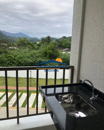 Imagem Apartamento com 2 dormitórios à venda, 57 m² por R$ 380.000 - Martim de Sá - Caraguatatuba/SP