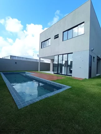 Imagem Imperdível: Casa de luxo em condomínio Alphaville, 4 quartos, 4 suítes, 2 salas, 4 vagas em Camaçari-BA