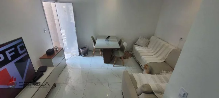 Imagem Sobrado com 2 dormitórios à venda, 73 m² por R$ 410.000,00 - Vila Caiçara - Praia Grande/SP