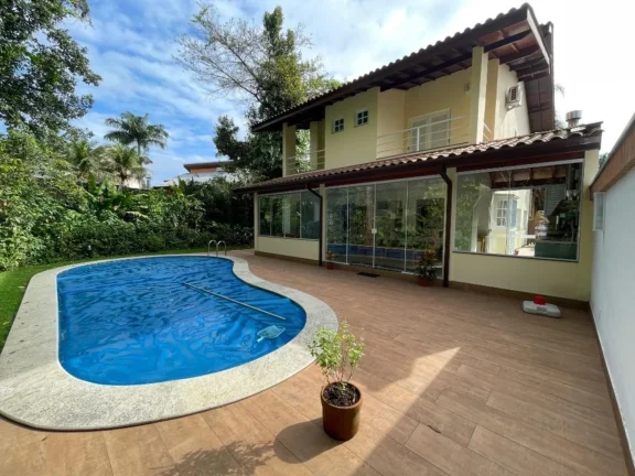 Imagem Imperdível Casa de Luxo à Venda em Riviera de São Lourenço Módulo 20: 4 Quartos, 4 Suítes, 2 Salas, 6 Vagas de Garagem!