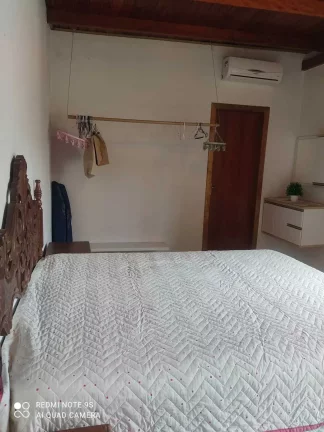 Imagem Apartamento com 2 dormitórios sendo 1 suíte e 1 vaga de garagem em Itapema/SC