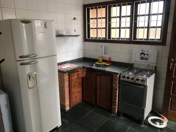 Imagem Sobrado com 4 dormitórios à venda, 193 m² por R$ 649.000 - Estufa I - Ubatuba/São Paulo