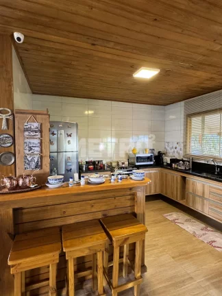 Imagem Casa à venda, no Brisas do Rio com Três quartos, piscina, jardim, muito verde