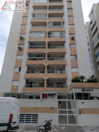 Imagem Apartamento à venda na Guilhermina, Praia Grande-SP: 2 quartos, 1 suíte, 1 vaga de garagem e 56m² de área. Adquira já!