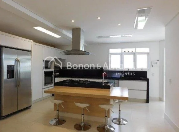 Imagem Casa em condomínio com 410 m² e 4 quartos