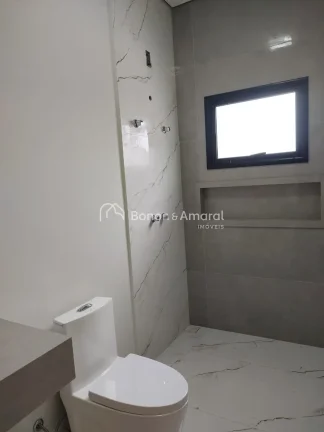 Imagem Esta casa térrea de 166 metros quadrados é uma joia de elegância e conforto. Com três quartos, s...