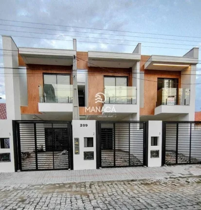 Lindo sobrado Geminado semi mobiliado no Centro de Balneário Piçarras