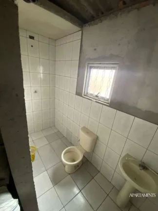 Imagem Terreno com 3 Casas com 3 vagas de carro e moto.