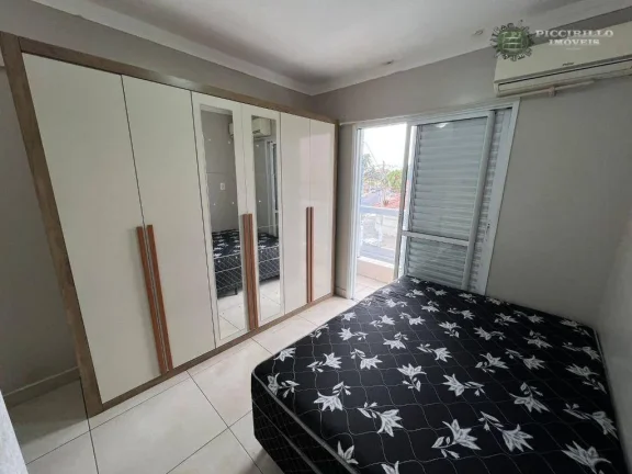Imagem Apartamento com 2 dormitórios à venda, 63 m² por R$ 475.000 - Vila Guilhermina - Praia Grande/SP