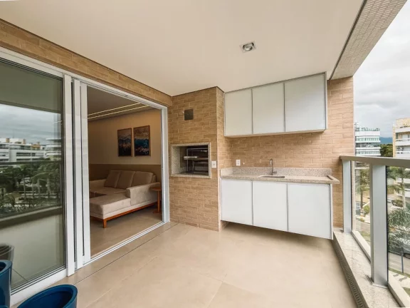 Imagem Imperdível apartamento de 3 quartos na Riviera de São Lourenço Módulo 07: 110,74m², 1 suíte, 3 salas, varanda gourmet e 2 vagas.