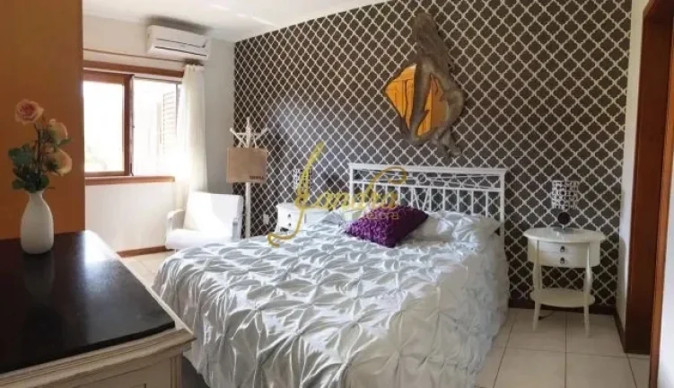 Imagem Casa térrea mobiliada e decorada em dois lotes, ótima localização
