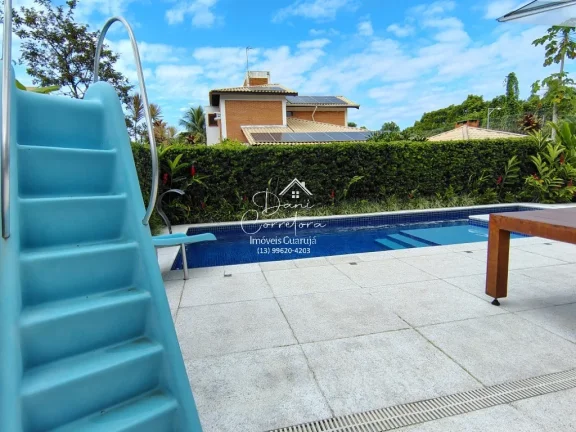 Imagem Casa de luxo em condomínio na Enseada, Guarujá-SP: 5 quartos, 5 suítes, 2 salas, 4 vagas e 390m² de área. Imperdível!