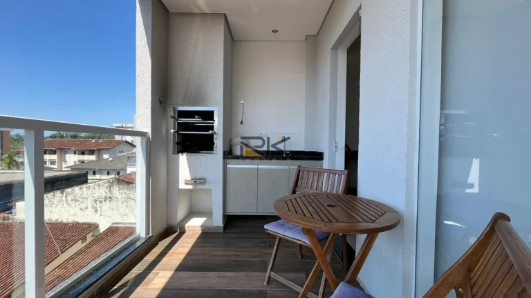 Imagem APARTAMENTO NO CENTRO COM 2 DORMITÓRIOS SENDO 1 SUÍTE, 1 BANHEIRO SOCIAL, VARANGA GOURMET COM CHURRASQUEIRA, 2 VAGAS DE GARAGEM