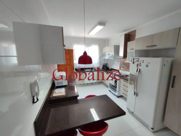 Imagem Casa sobreposta alta com 3 dormitórios, 2 vagas de garagem na Vila belmiro em Santos por R$ 910.000,00