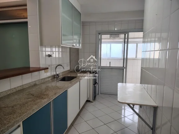 Imagem Apartamento à venda no Jardim Astúrias, Guarujá-SP: 3 quartos, 1 suíte, 2 salas, 2 banheiros, 2 vagas de garagem, 110m².