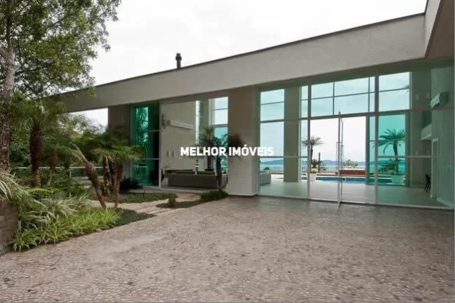 Imagem Casa Alto Padrão mobiliada e decorada á venda com 6 suítes e 8 vagas na Interpraias em Balneário Camboriú.