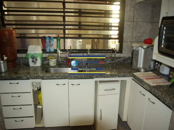 Imagem Casa bairro Campos Eliseos vende, R$ 450.000 com 3 dormitórios (1 suíte), 2 vagas, piscina - Ribeirão Preto - SP