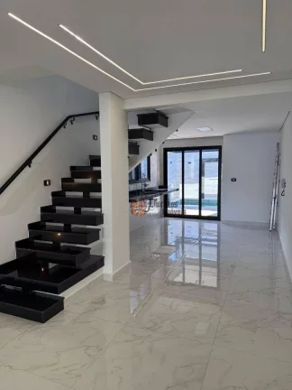 Imagem Sobrado com 4 suítes à venda, 204 m² por R$ 1.690.000 - Boqueirão - Praia Grande/SP