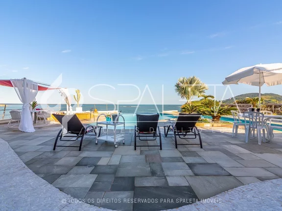 Imagem Belíssima mansão mobiliada com 10 suítes e vista para o mar à venda na Praia do Pernambuco no Guarujá