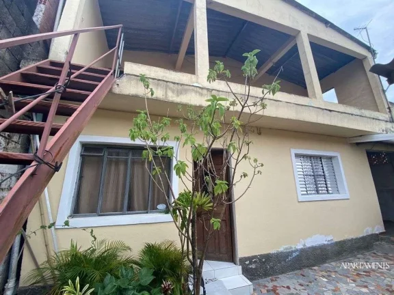 Imagem Terreno com 3 Casas com 3 vagas de carro e moto.