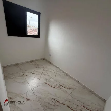 Imagem Sobrado com 2 dormitórios à venda, 54 m² por R$ 345.000 - Maracanã - Praia Grande/SP