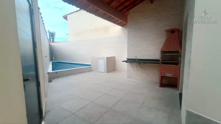 Imagem CASA DE ESQUINA COM PISCINA EM MONGAGUÁ LADO PRAIA !