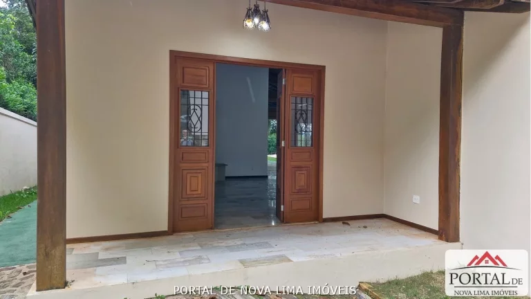 Imagem Casa a venda no condomínio Ipê da Serra, casa com armário e área de lazer com piscina. Venha conhecer no Portal de Nova Lima Imóveis - 31.98511-8000