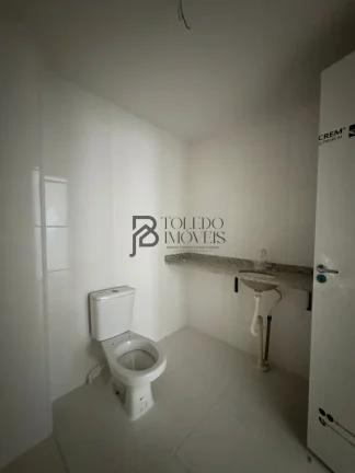 Imagem Apartamento de 2 dormitórios sendo 1 suíte, prédio frente mar no bairro Vila Mirim - Praia Grande