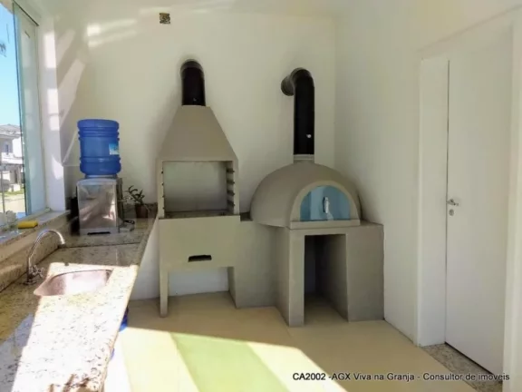 Imagem Casa com 3 dormitórios à venda, 168 m² por R$ 970.000,00 - Granja Viana - Cotia/SP