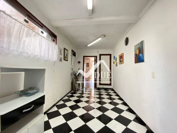 Imagem Sobrado com 3 dormitórios à venda, 109 m² por R$ 850.000,00 - Gonzaga - Santos/SP