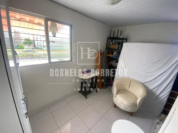Imagem Casa Espaçosa com 6 Quartos e 2 Suítes à Venda por R$ 600 Mil