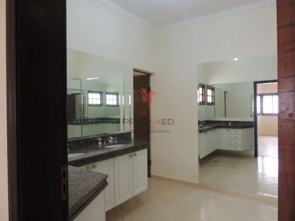 Imagem Casa com 3 suítes, 3 vagas de garagem. Imóvel de alto padrão no portal daa colinas