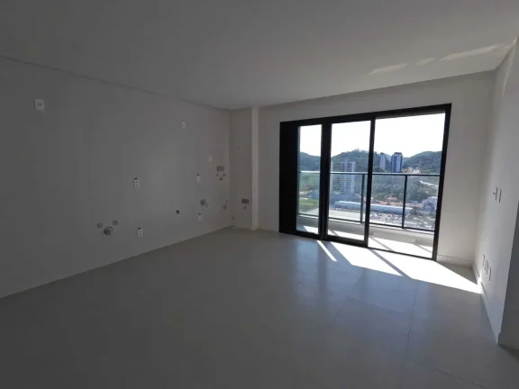 Imagem Apartamento com 2 dormitórios sendo 1 suíte e 2 vagas de garagem na Praia Brava/SC