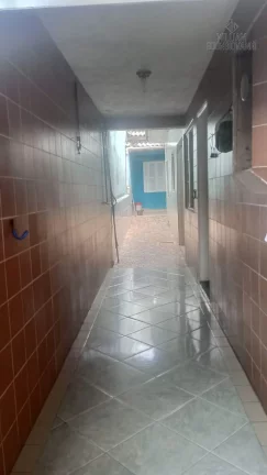 Imagem Casa em Praia Grande, na Vila Tupi, 2 dormitórios e área construída de 93,7 m².