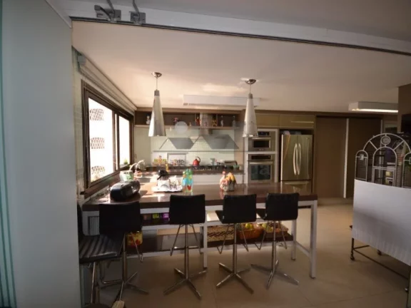 Imagem Magnífica cobertura em excelente localização!! Finamente decorada. No piso superior: cozinha amer...