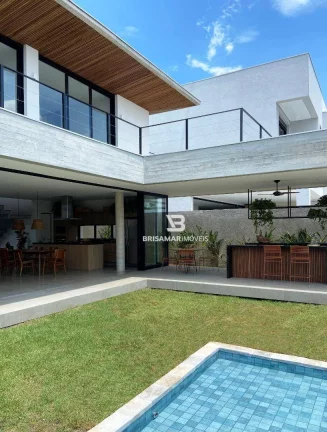 Imagem CASA DE ALTO PADRÃO EM CONDOMÍNIO PRIVILEGIADO NO GUARUJÁ – 5 SUÍTES, ÁREA GOURMET E BEACH HOUSE