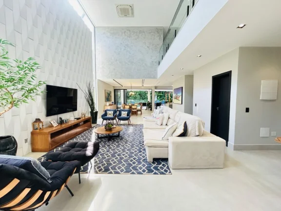 Imagem Casa de Luxo à Venda na Riviera de São Lourenço Módulo 17: 8 Quartos, 8 Suítes, 3 Salas, 4 Vagas de Garagem e 620m² de Área!